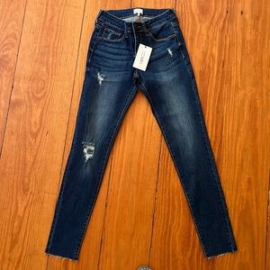 Skinny, distressed, rough edge jeans